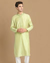 alt message - Manyavar Men Light Green Kurta Pajama With Minimal Work image number 1